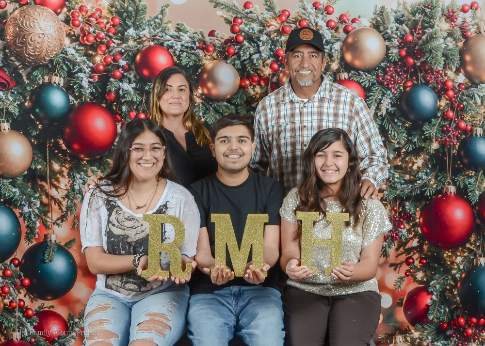 People holding RMH sign